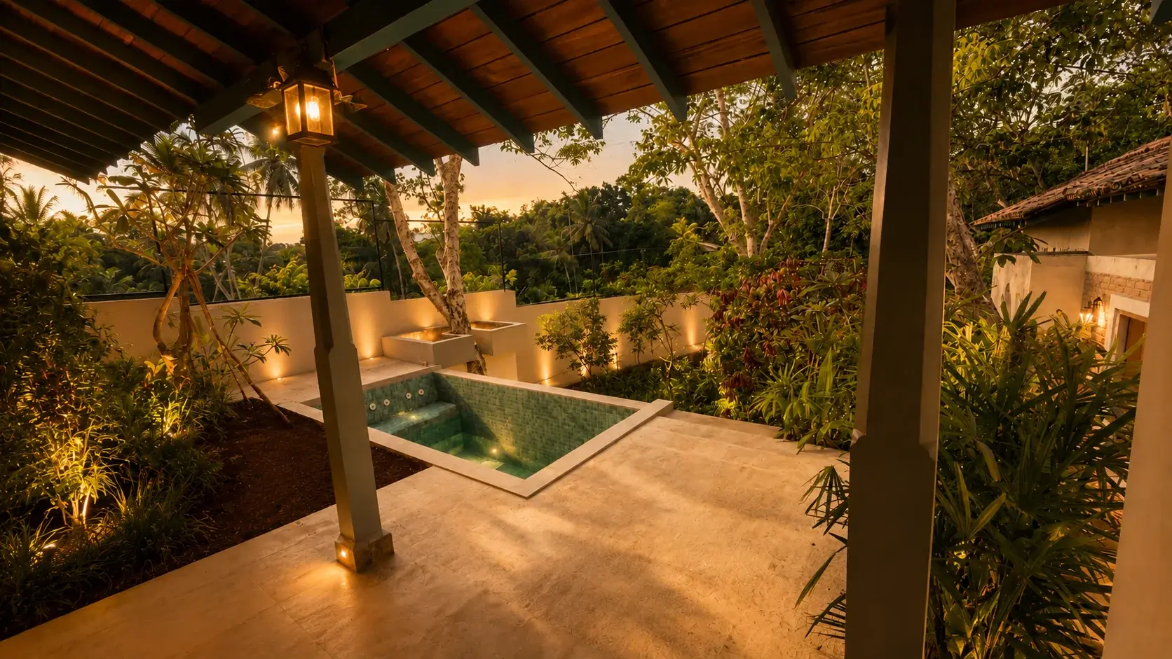 Villa Three's plunge pool and covered pergola at dusk